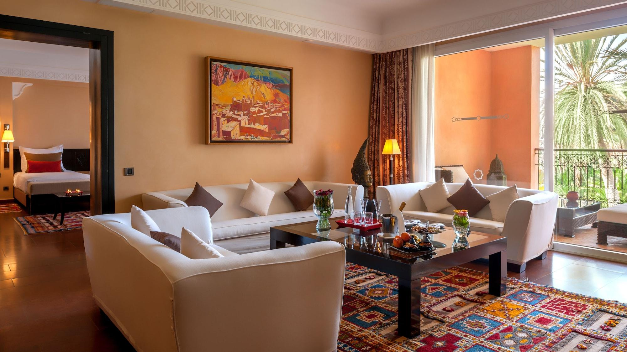 티키다 골프 팰리스 렐레 앤 샤토 호텔 아가디르 외부 사진 A living room in a suite at the hotel