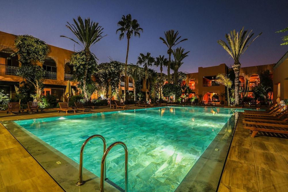 티키다 골프 팰리스 렐레 앤 샤토 호텔 아가디르 외부 사진 The swimming pool at the hotel