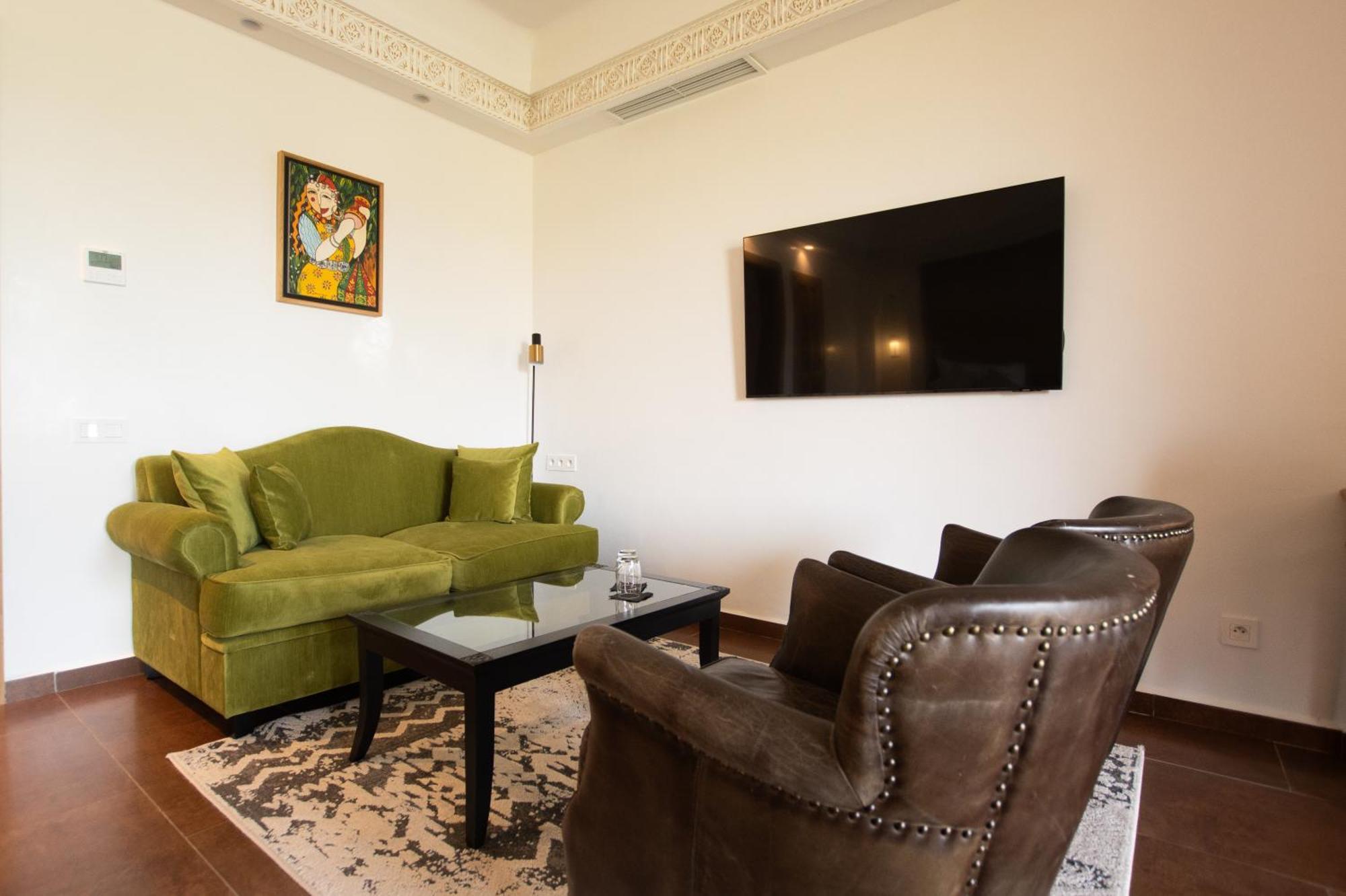 티키다 골프 팰리스 렐레 앤 샤토 호텔 아가디르 외부 사진 A living room in the residence