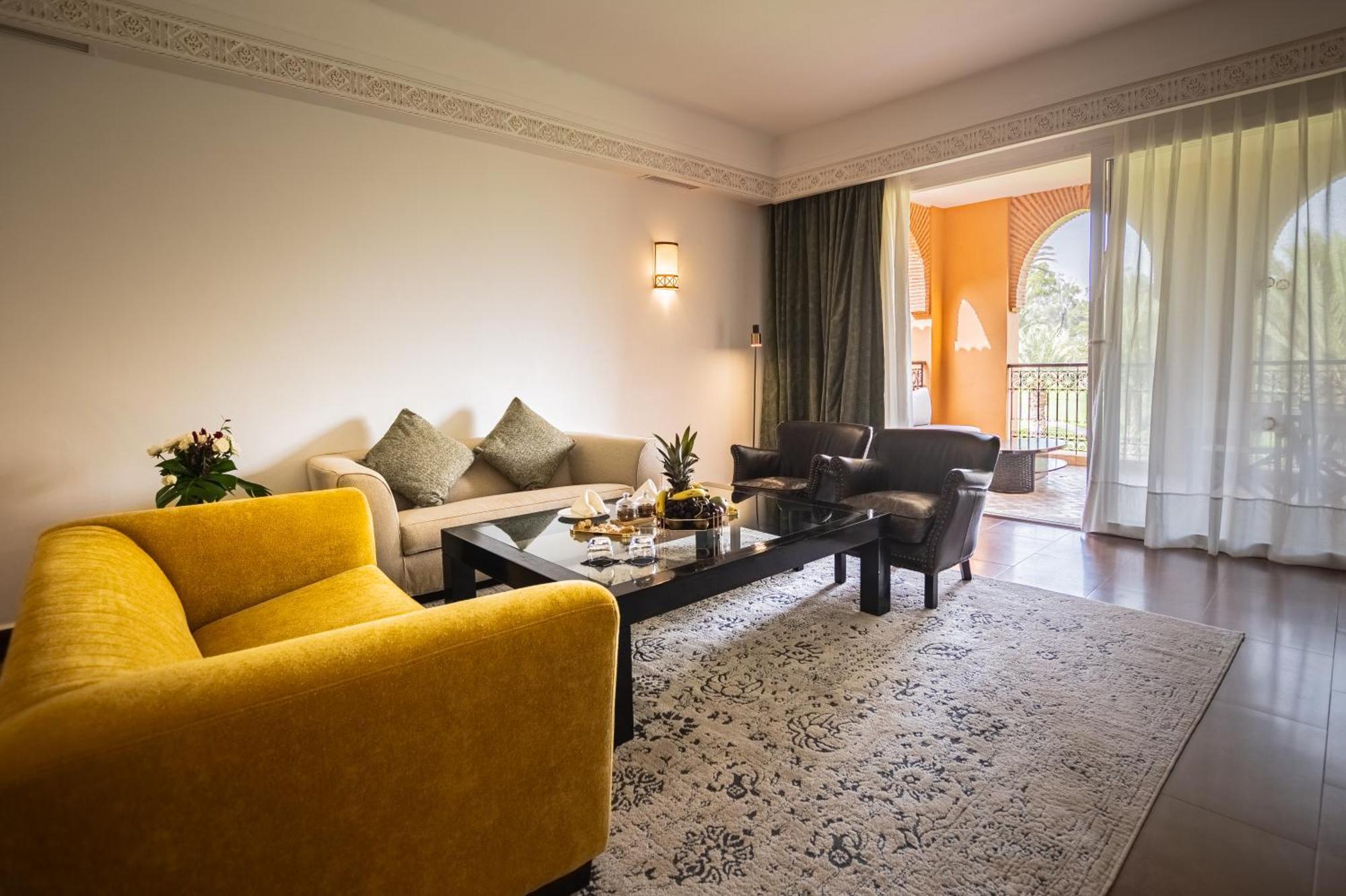 티키다 골프 팰리스 렐레 앤 샤토 호텔 아가디르 외부 사진 A living room at the hotel
