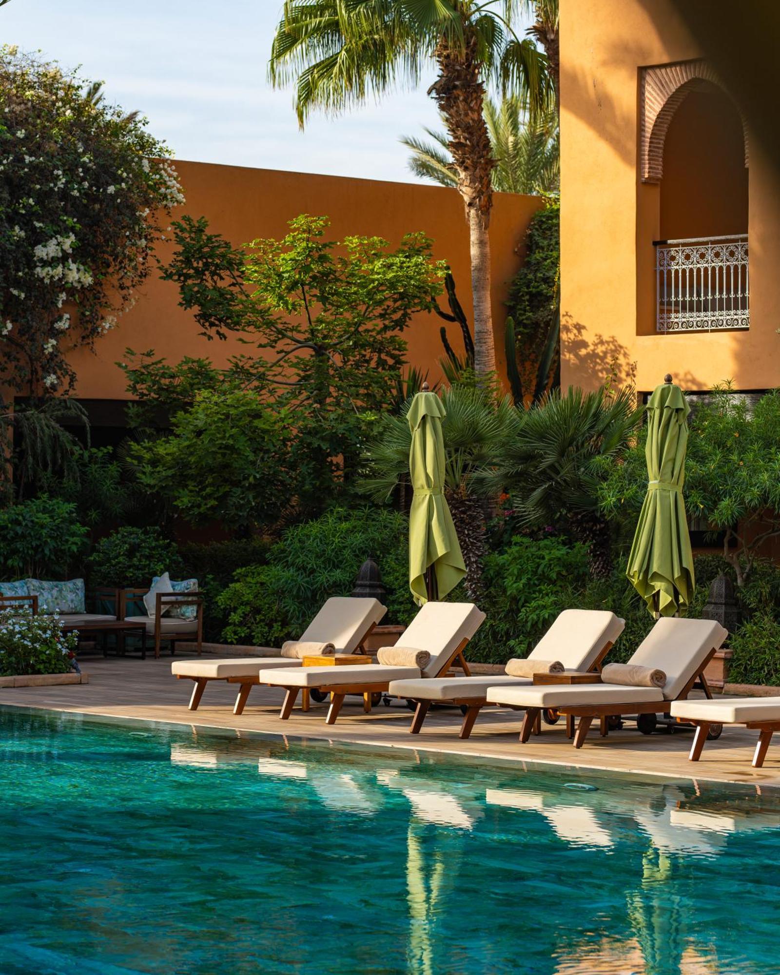 티키다 골프 팰리스 렐레 앤 샤토 호텔 아가디르 외부 사진 The swimming pool at the Four Seasons Hotel, Marrakech